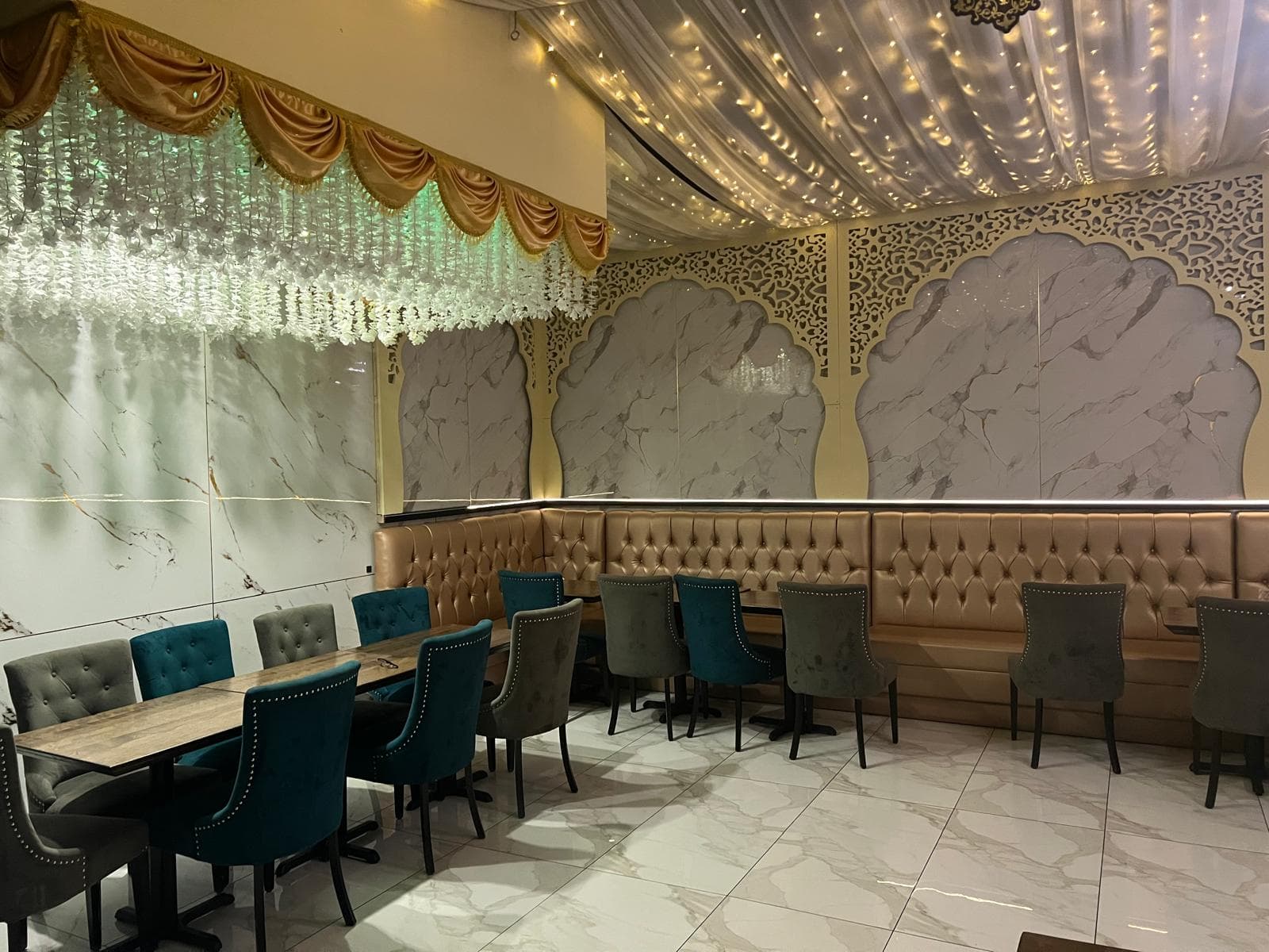 Professional catering buffet setup with authentic North Indian dishes at The Grand Mehfil